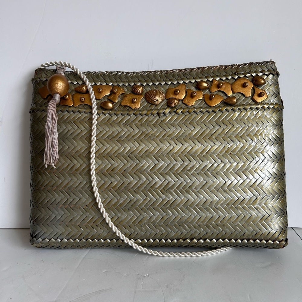 Elegant Gold Woven Clutch with Tassel